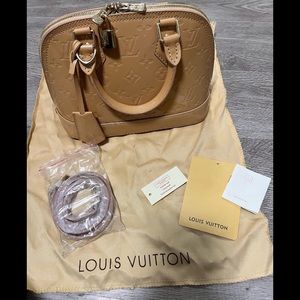 Louis Vuitton alma bb bag